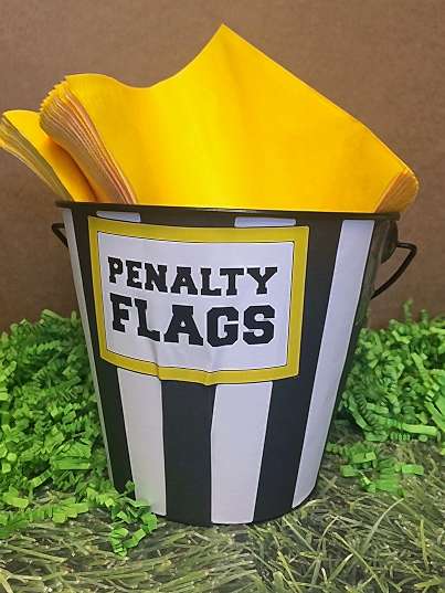 Napkins in a Penalty Flag Bucket